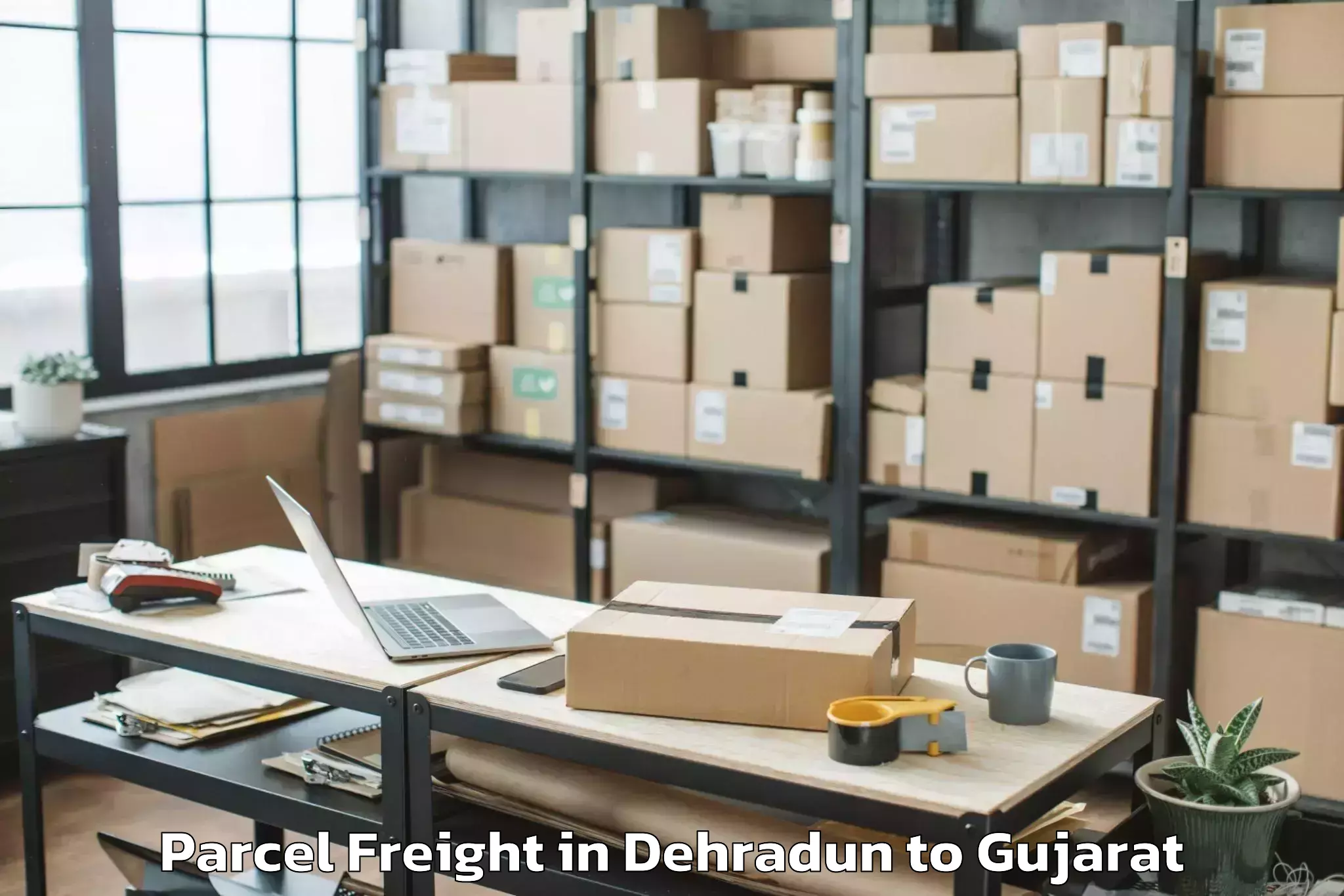 Easy Dehradun to Paliyad Parcel Freight Booking